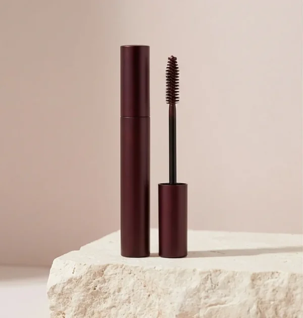 Velvet Lash Mascara – Black, 8 ml Burgundy mascara packaging with a spiral application brush.